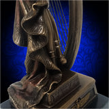 Bronze-coated Cleopatra the Harpist Statue. Oh, and Empress of the Nile